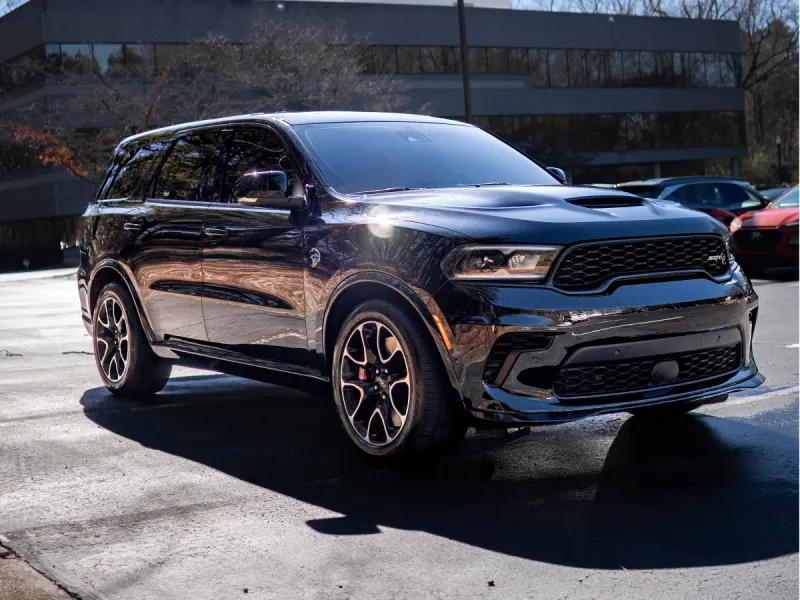 Black Dodge Durango with a high-gloss finish after a full exterior detail in Kennesaw