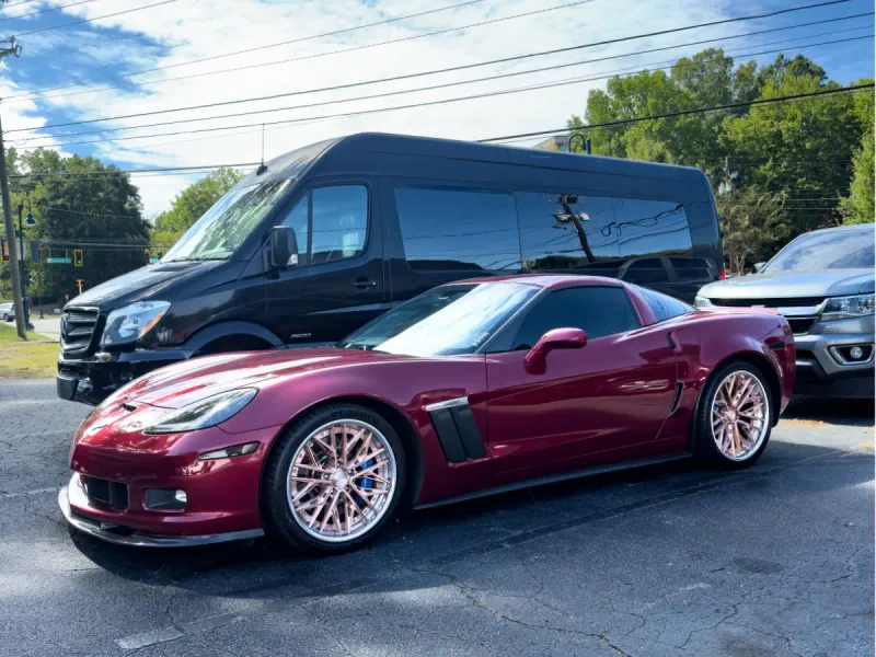 Deep red Corvette detailed and polished on a street in Kennesaw